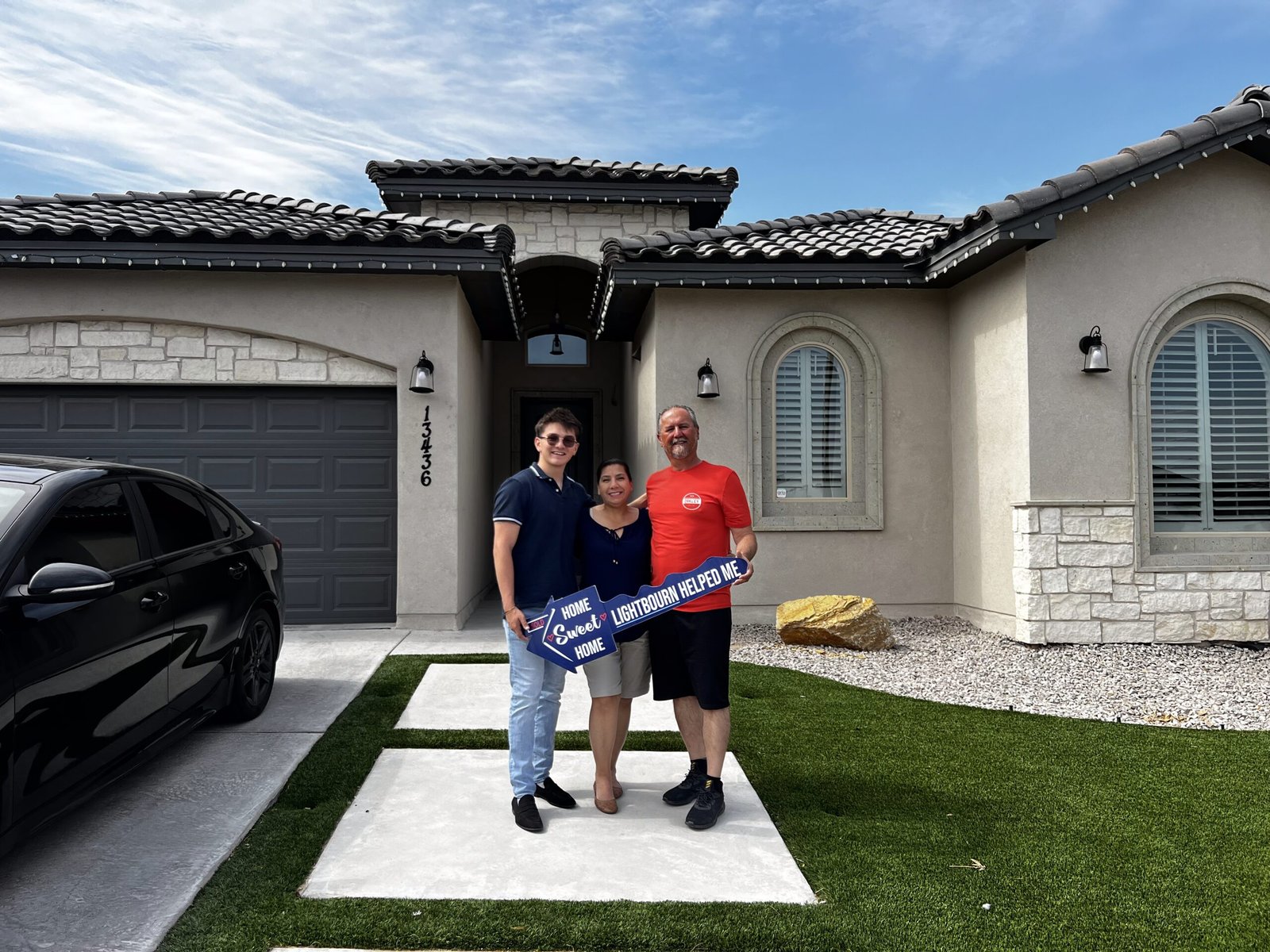 Expert real estate agent from The Lightbourn Group discussing home options with clients in El Paso, TX