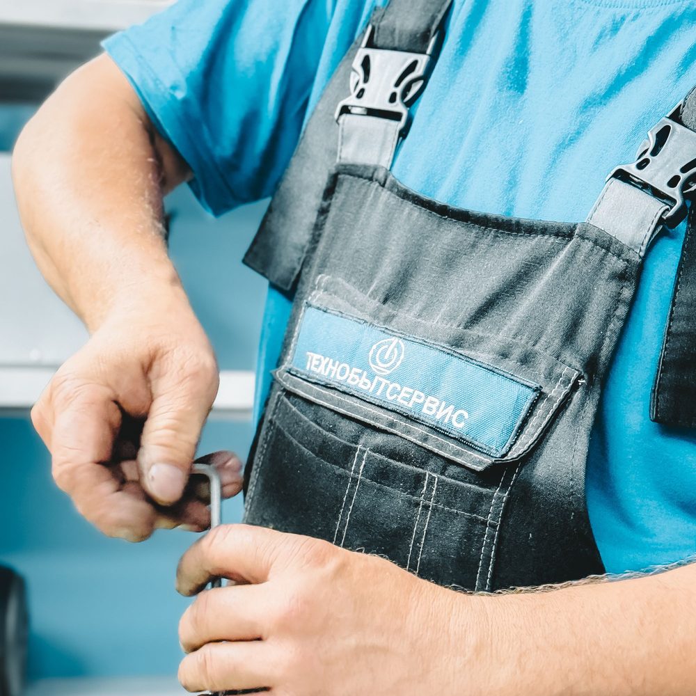 Local plumbing partner installing water treatment equipment